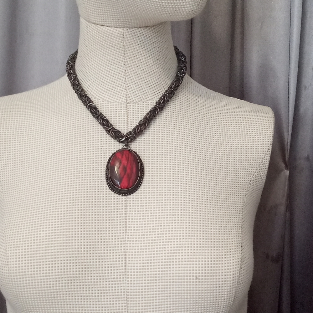 Antique faux oval amber pendant